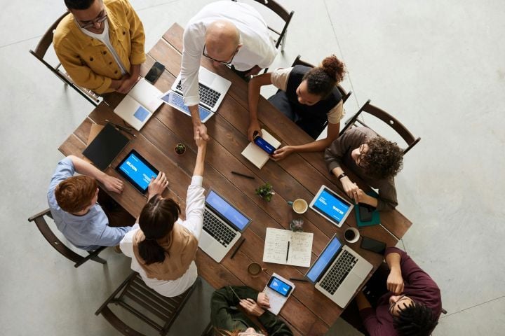 A thriving dealership is built on collaboration, Marburger says. - Pexels/fauxels
